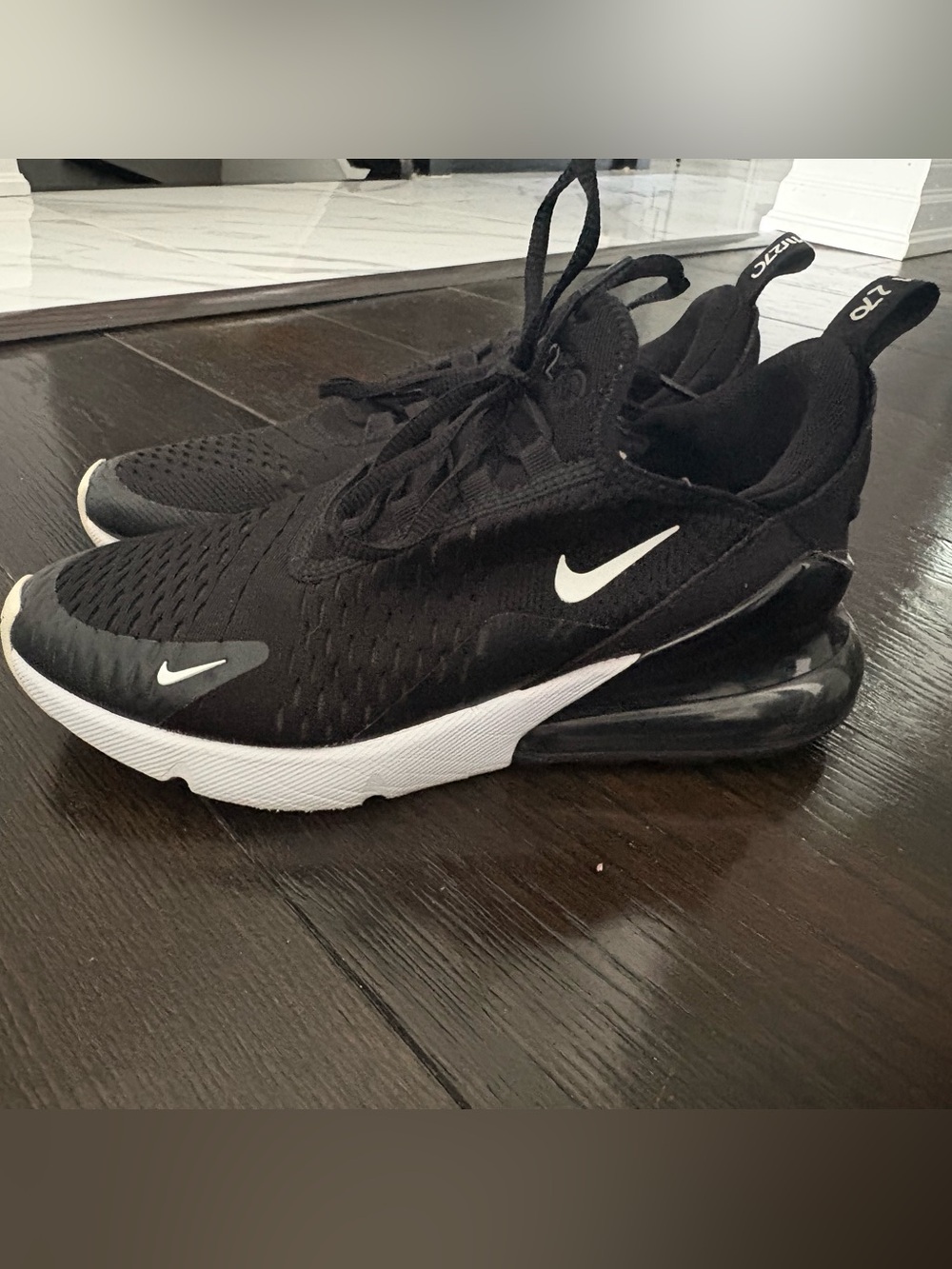 black and white Nike Air Max 270